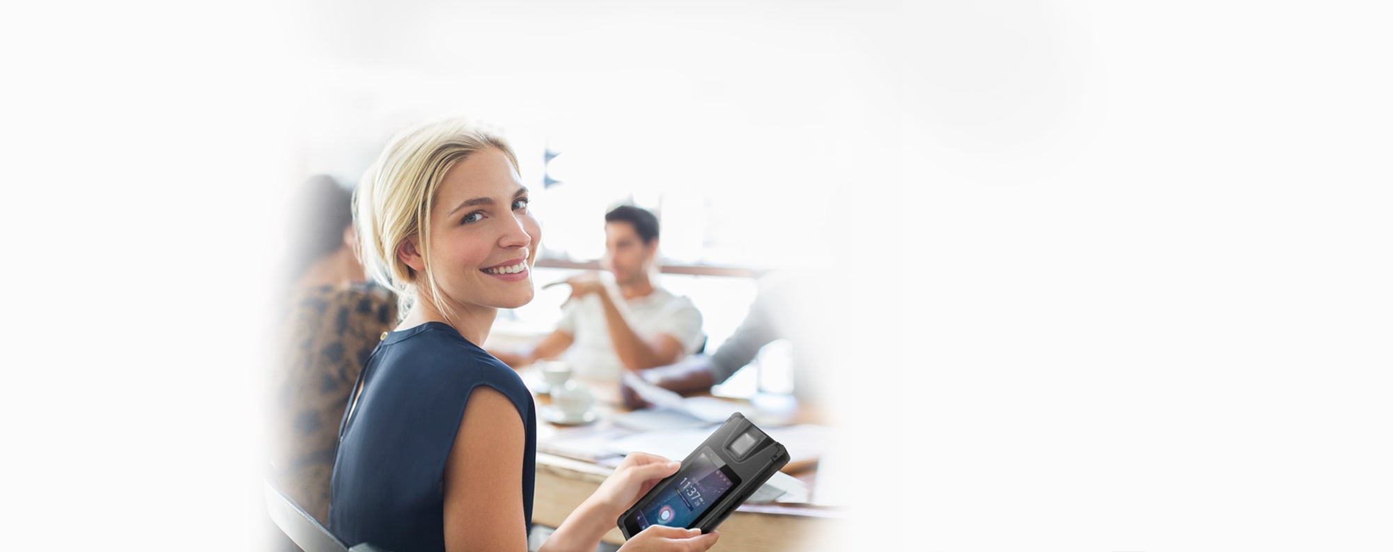 Woman holding UBio tablet