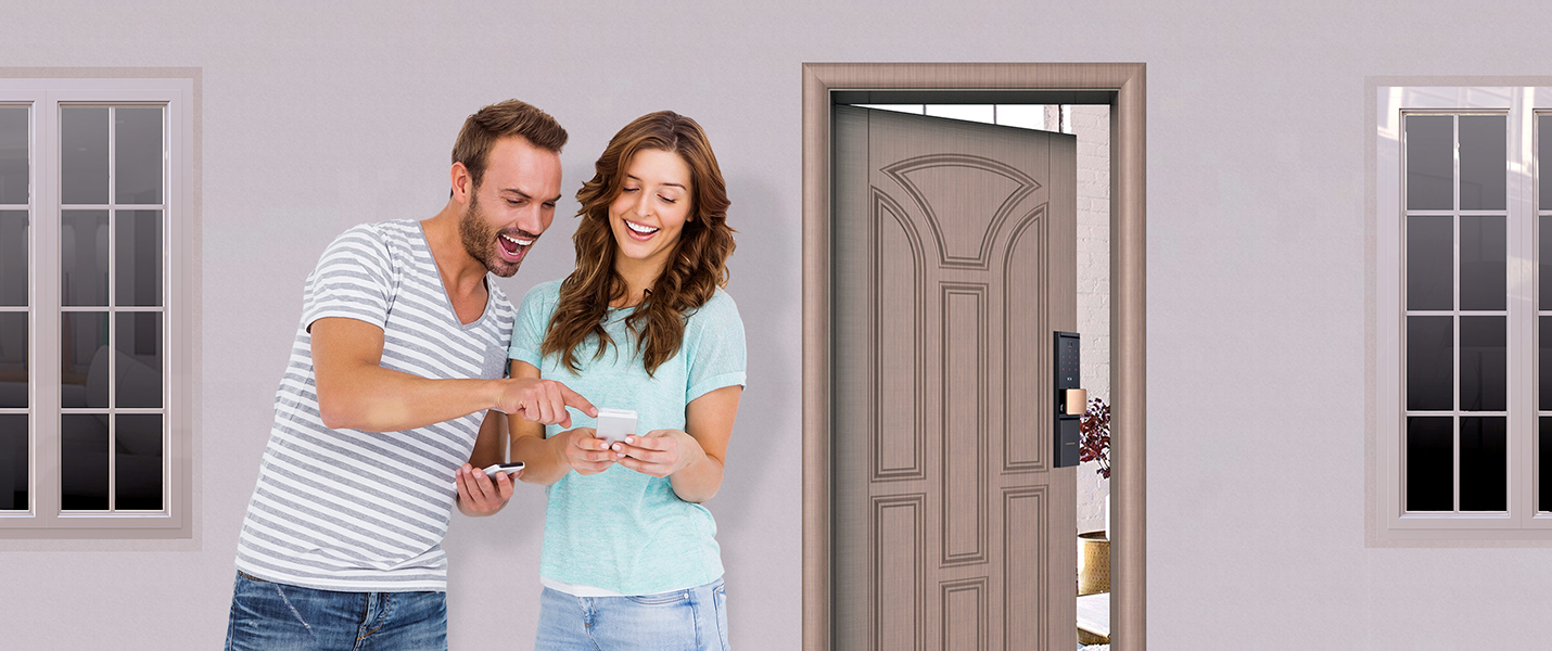 Man and woman in front of door with smart lock