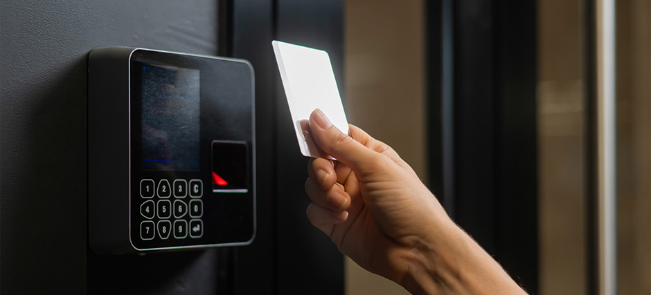 Person using card to unlock security system